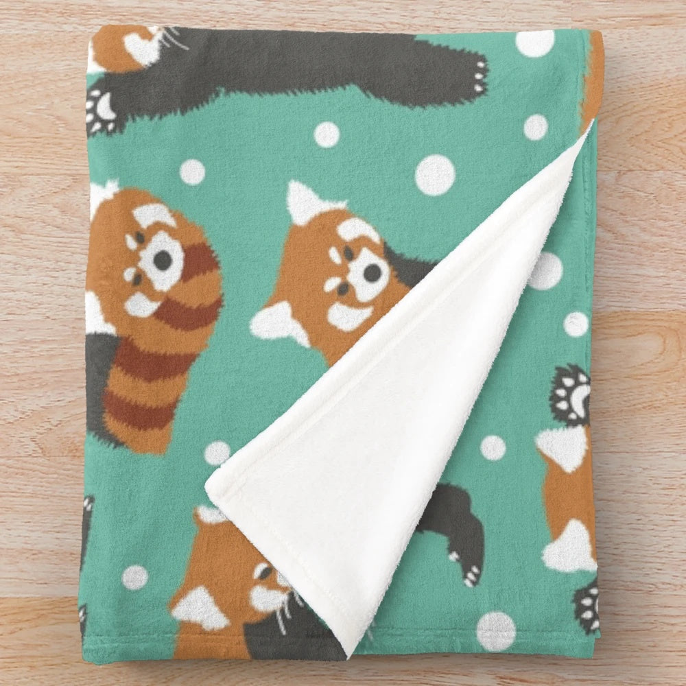 Soft and fluffy plush blanket featuring a cute red panda pattern with white dots and a turquoise background