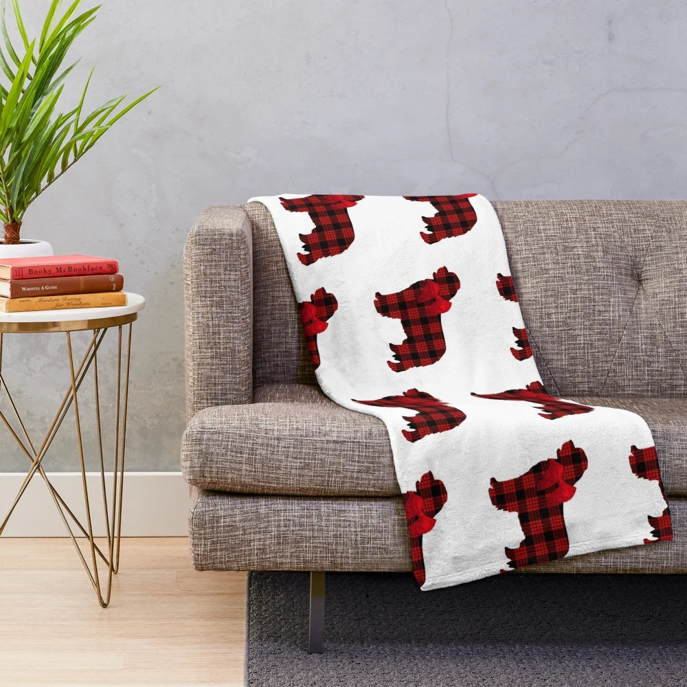 Red plaid plush blanket featuring an adorable Newfoundland dog