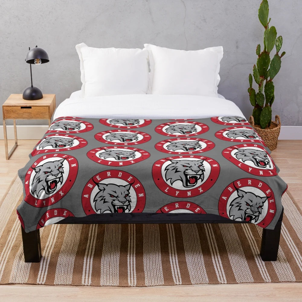 Red plush blanket with Aberdeen Lynx logo