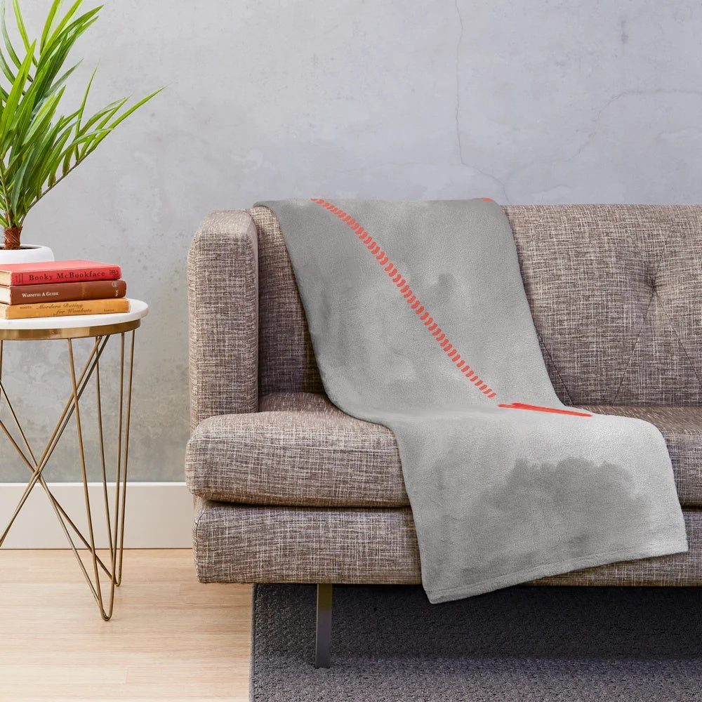 Red plush blanket with anime-inspired Staple Stable design