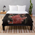 Red plush blanket with rose pattern, perfect for music lovers and lesbian pride