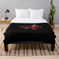 Cozy red plush holiday blanket with a festive design