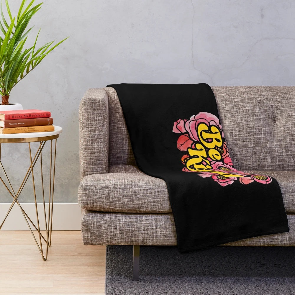 Red poppy art plush blanket with inspiring "Be Kind" message
