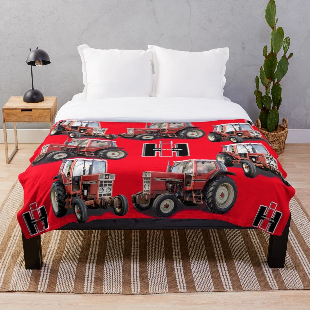 Soft and comfy red tractor plush blanket for farmhouse or country-style decor