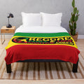 Reggae-inspired plush blanket with peace symbol and rasta colors