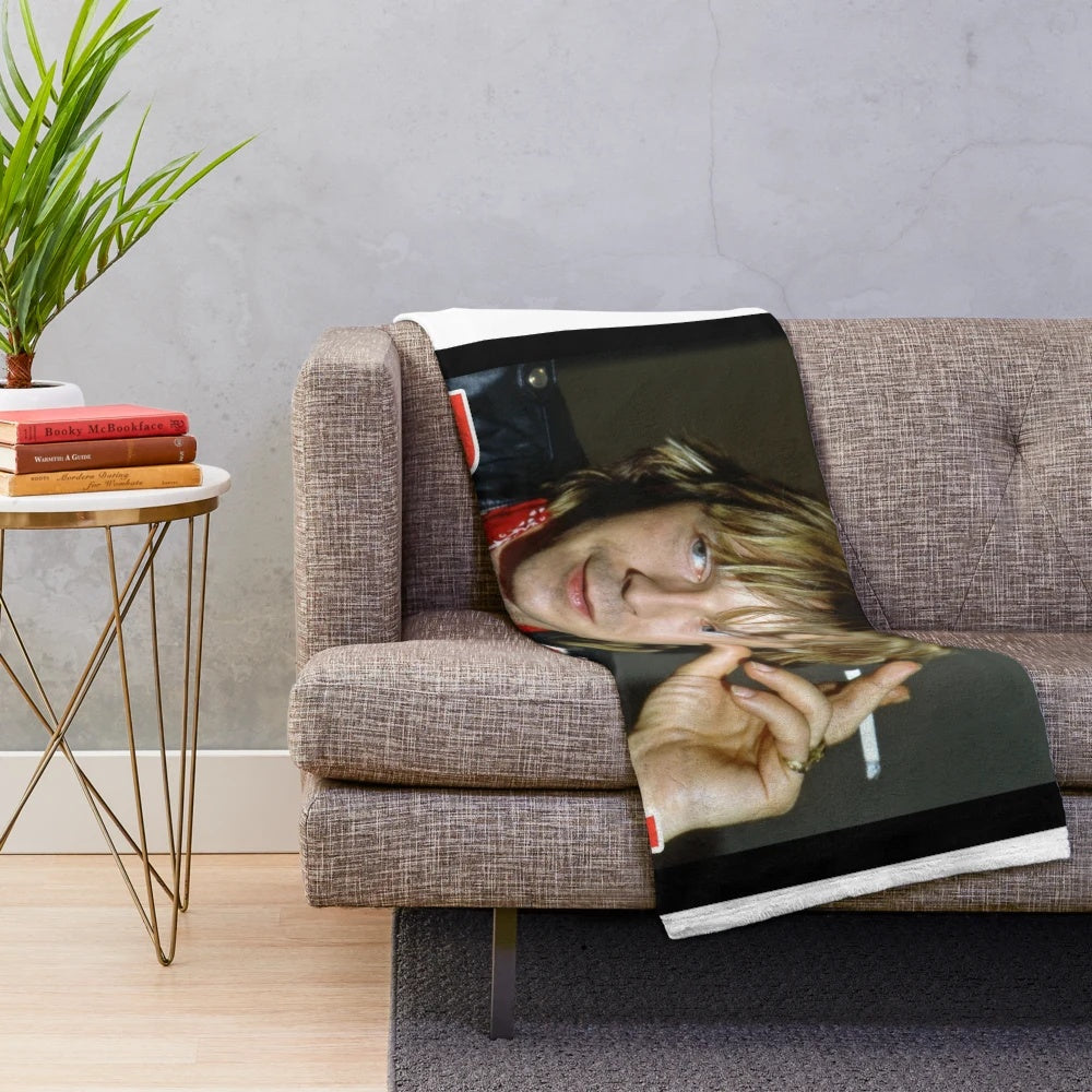 Renaud-inspired plush blanket featuring the French singer-songwriter's signature style