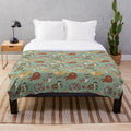 Green plush blanket with reptile pets print design
