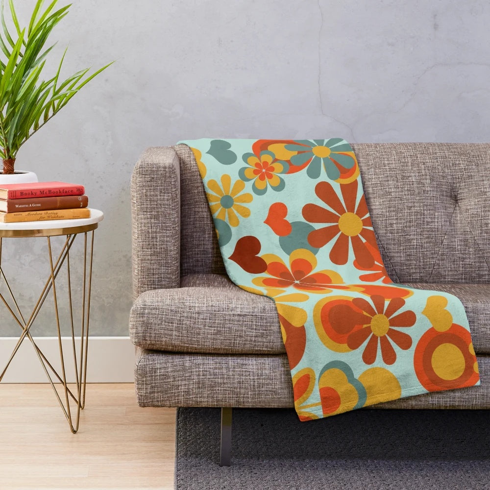 Vintage 70s flower power plush blanket in muted retro colors