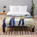 Plush blanket featuring a vintage baseball scene with kids playing the game