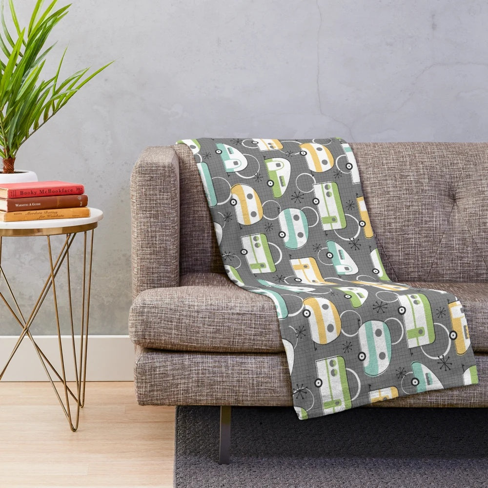 Comfy plush throw blanket with retro camper design for cozy van life