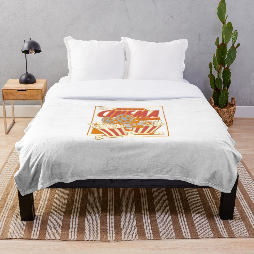 Retro cinema-themed popcorn plush blanket with minimalist design