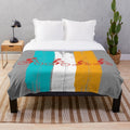 Retro-styled plush blanket featuring family cycling imagery