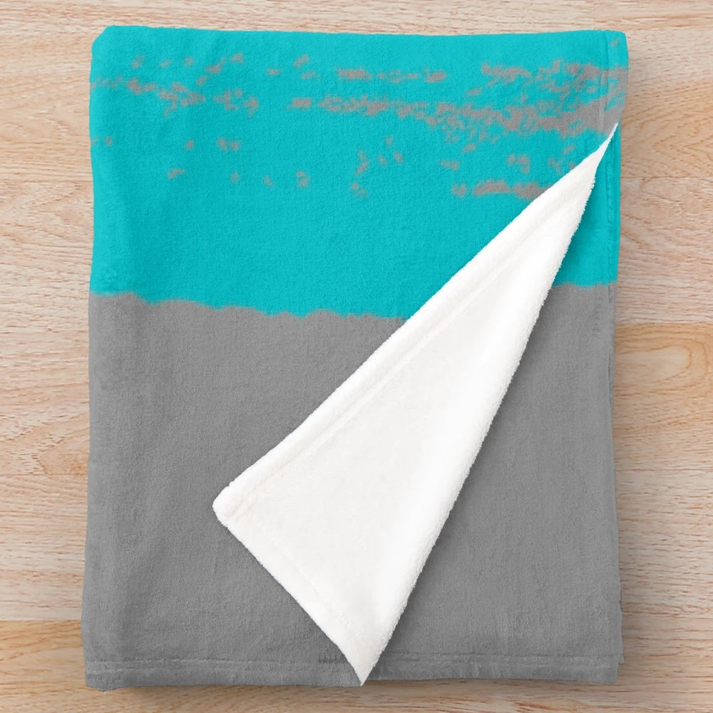 Retro-styled plush blanket featuring family cycling imagery