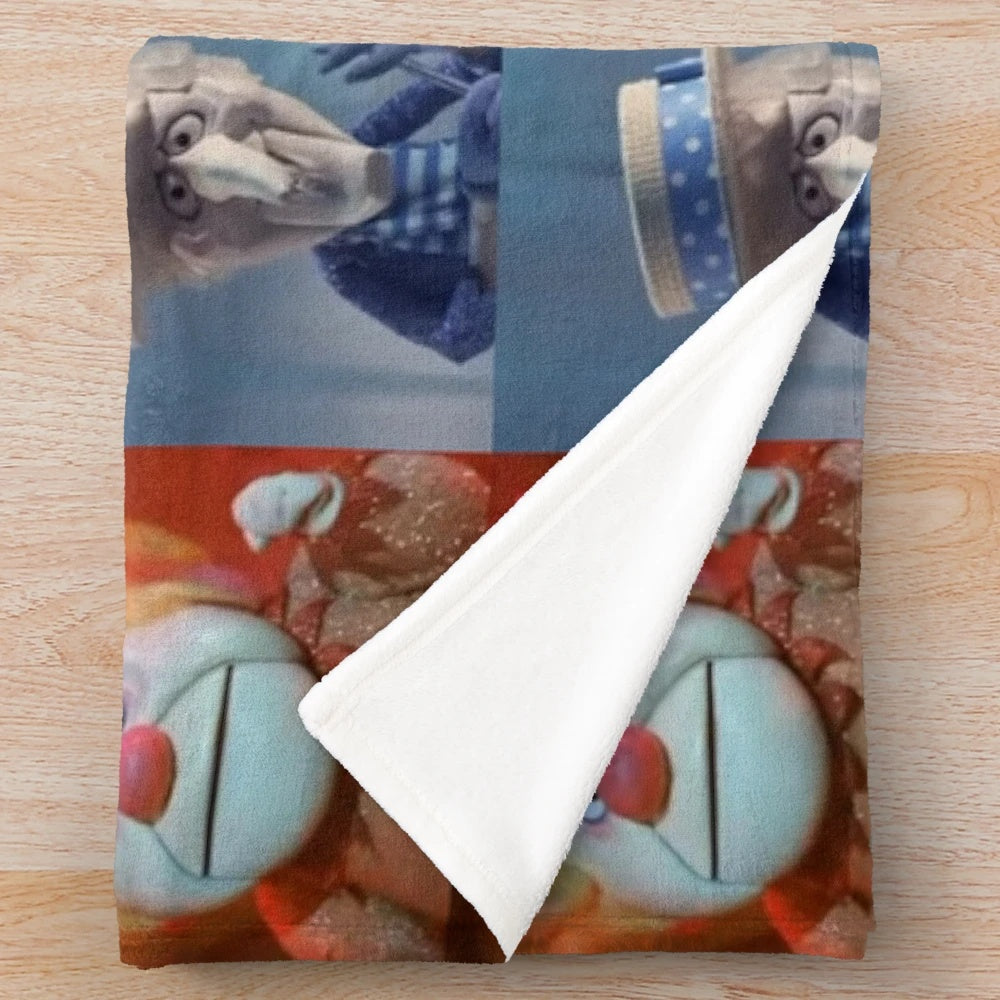 Vintage-style plush blanket with classic Christmas characters and imagery