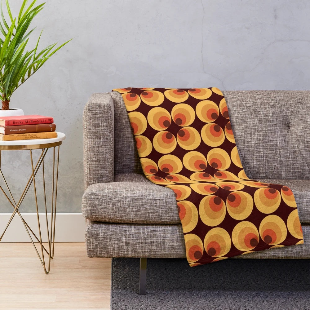 Retro orange plush blanket with circles and 70s aesthetic pattern