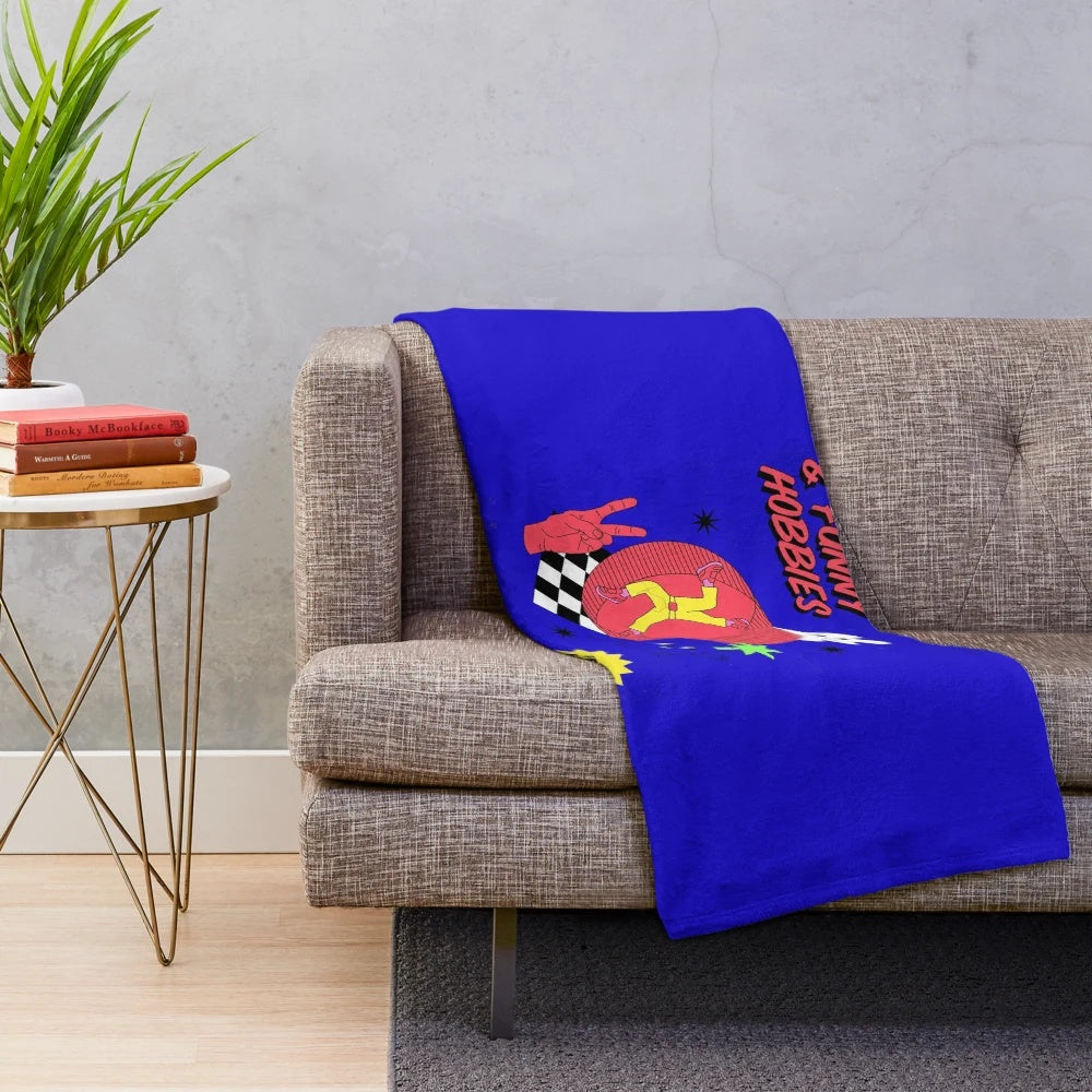 Colorful plush blanket with retro, whimsical hobby-themed design