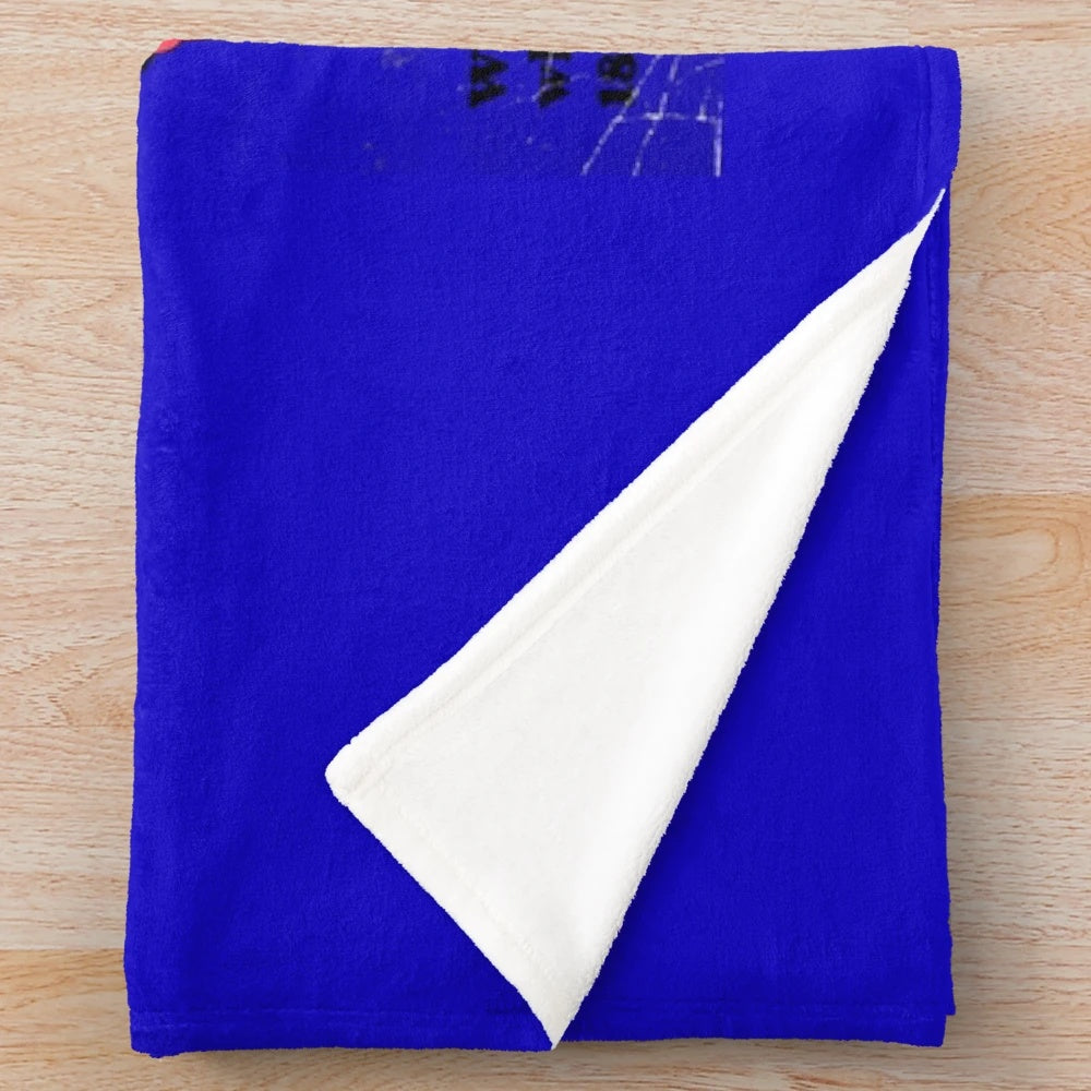 Colorful plush blanket with retro, whimsical hobby-themed design