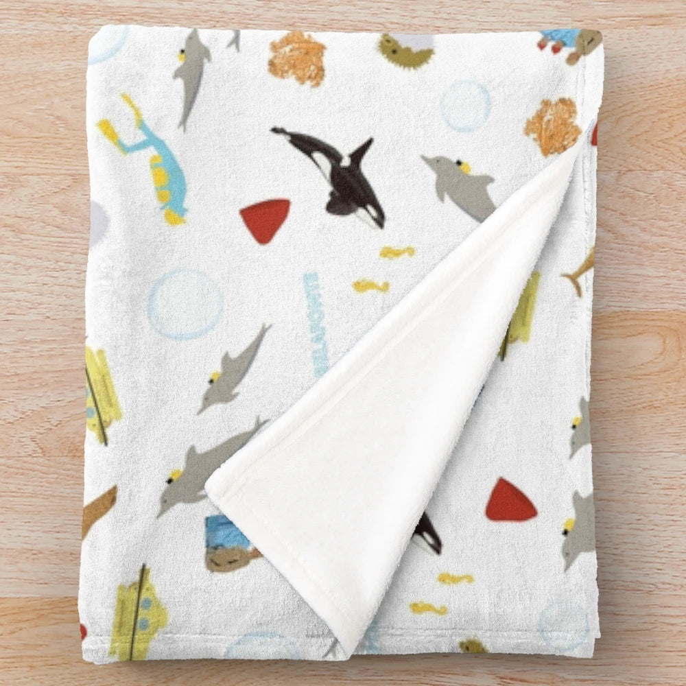 Cozy plush blanket featuring a repeating pattern inspired by the Wes Anderson film The Life Aquatic with Steve Zissou