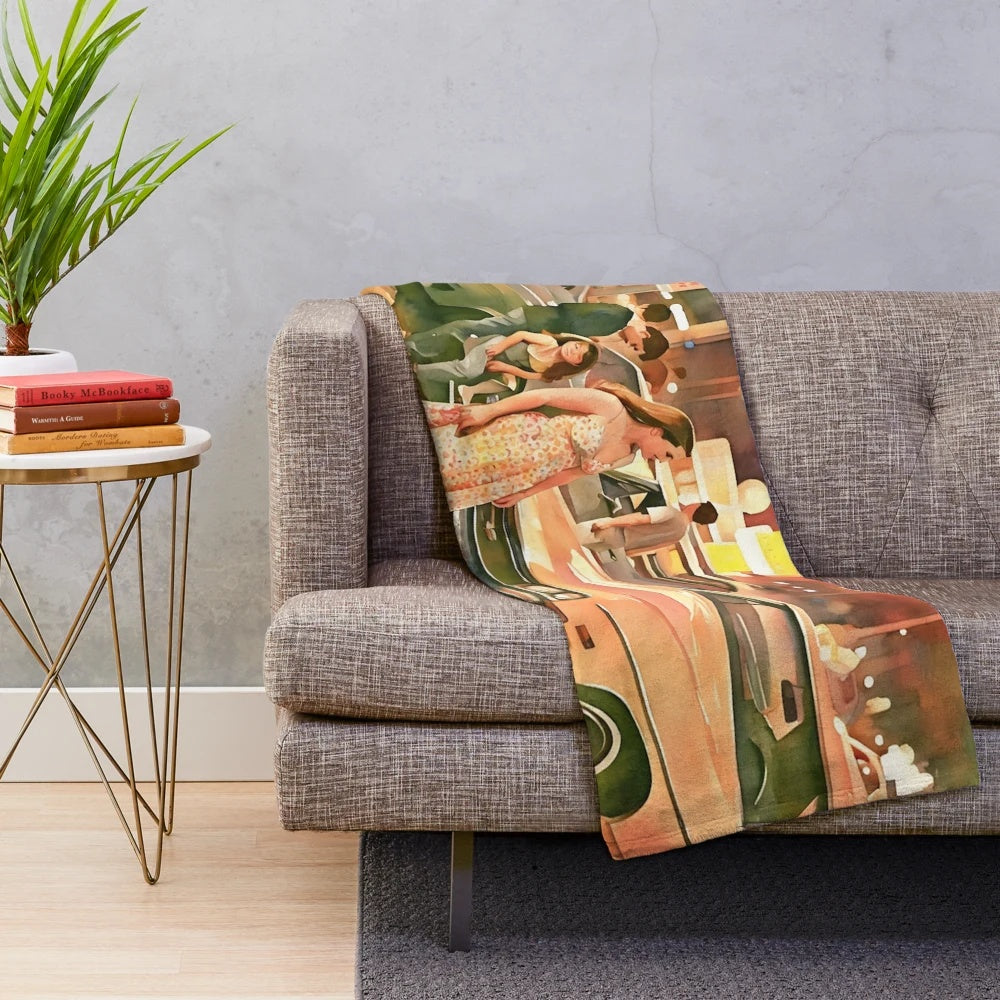 Plush retro-inspired blanket with classic car and diner motifs