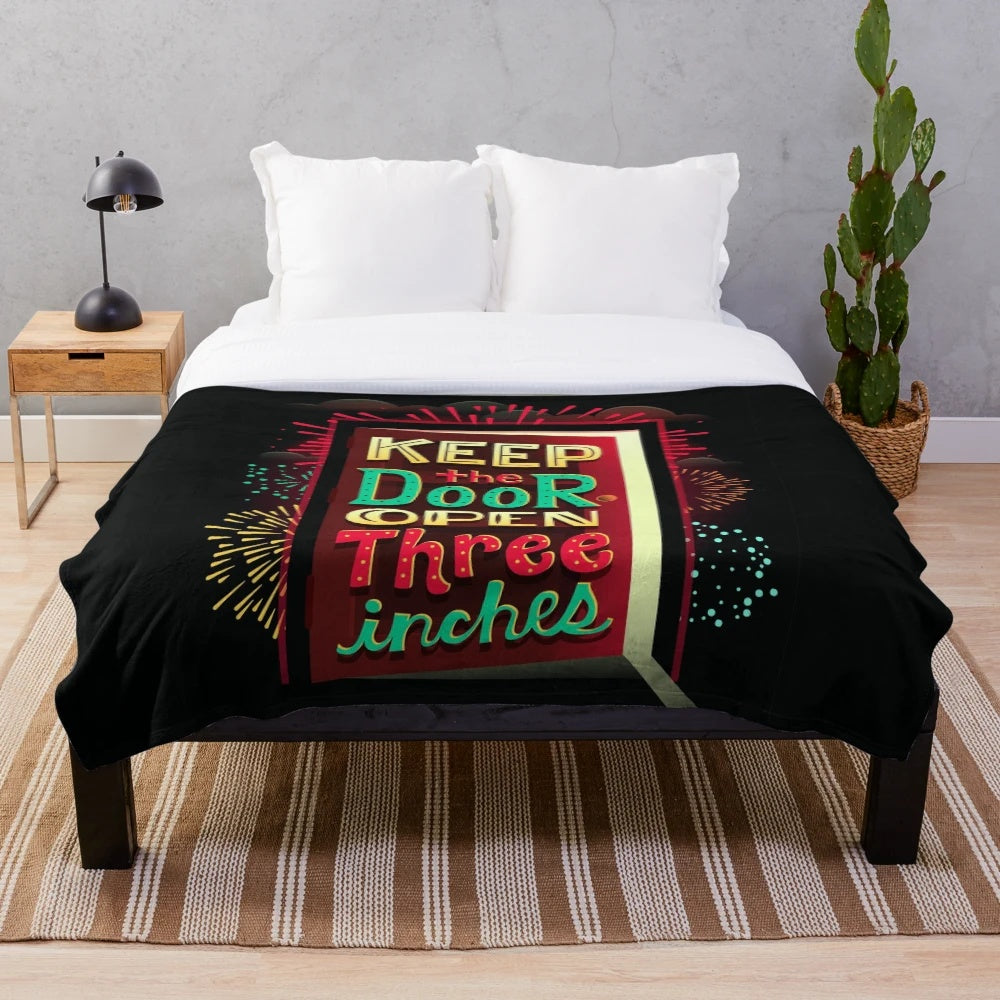 Plush blanket with a retro sci-fi inspired design featuring neon colors and fireworks
