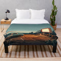 Retro plush blanket with vintage drive-in movie and car design