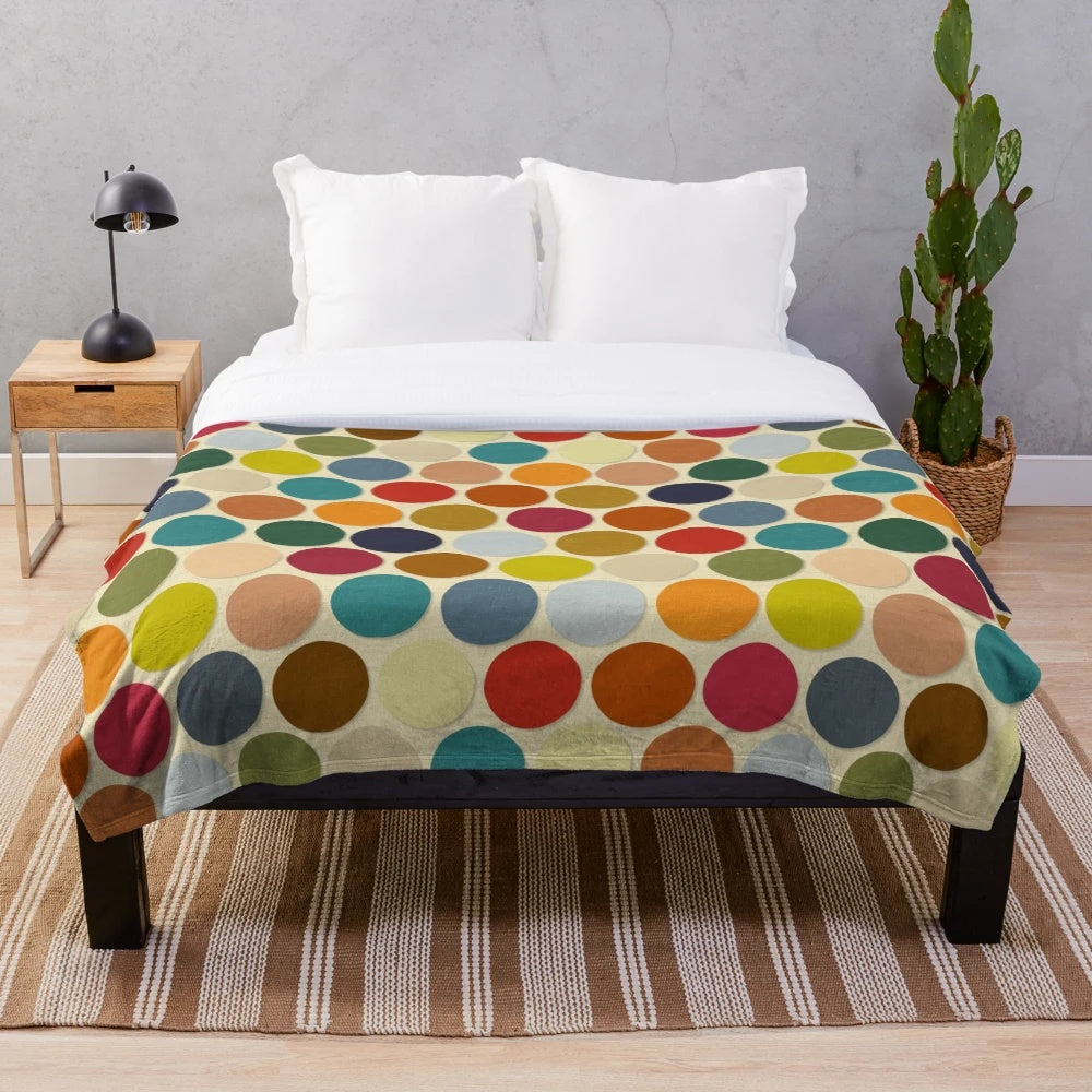 Plush polka dot blanket in autumn colors