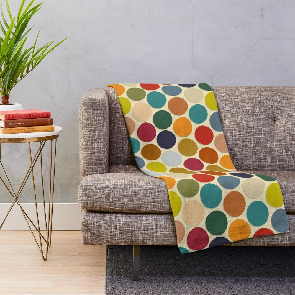 Plush polka dot blanket in autumn colors