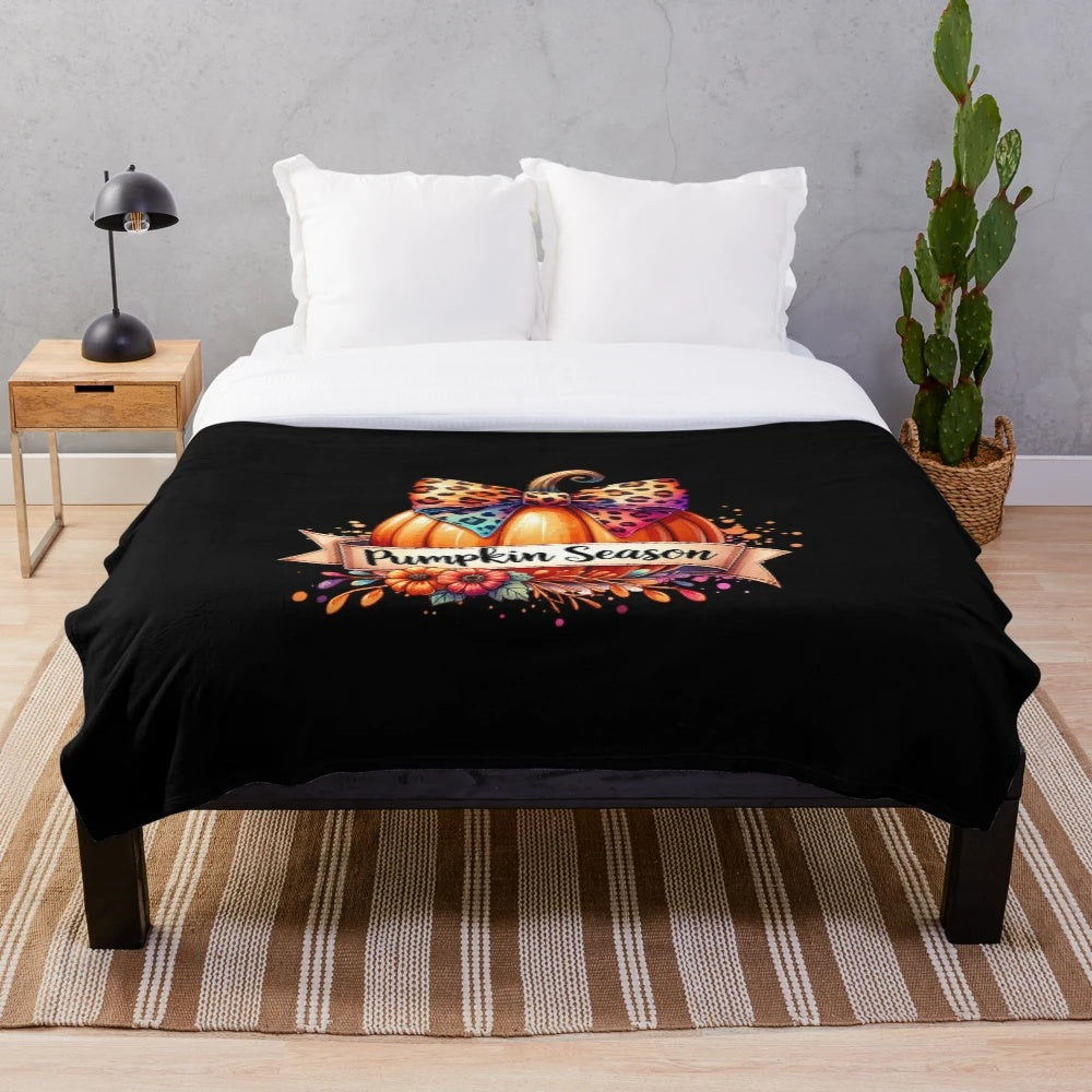 Retro fall inspired plush blanket featuring a pumpkin pattern in an autumn glam design