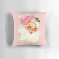 A plush, pink pillow featuring a vintage-style illustration of Santa Claus in a retro design.