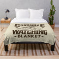 Gunsmoke-themed plush blanket with classic western design