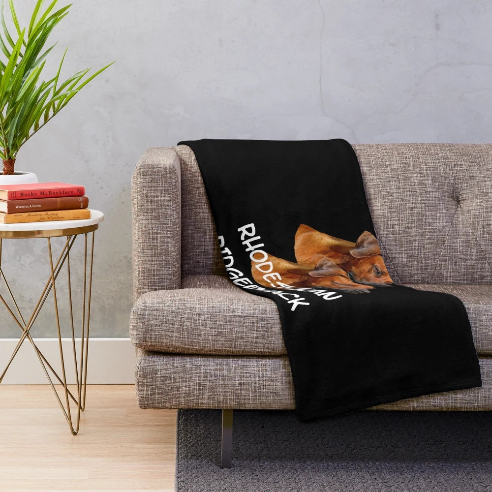 Rhodesian Ridgeback dog portrait on a cozy plush blanket