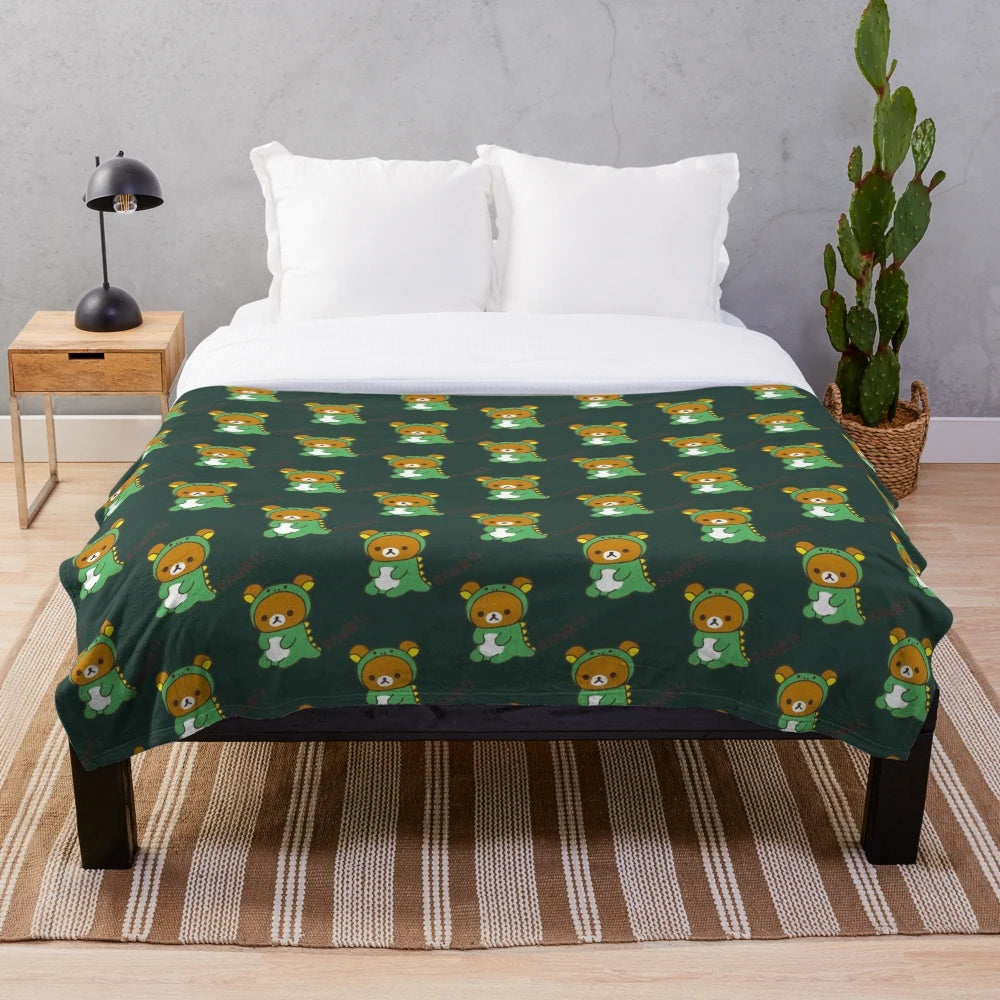 Rilakkuma-themed plush blanket with dino dragon costume design