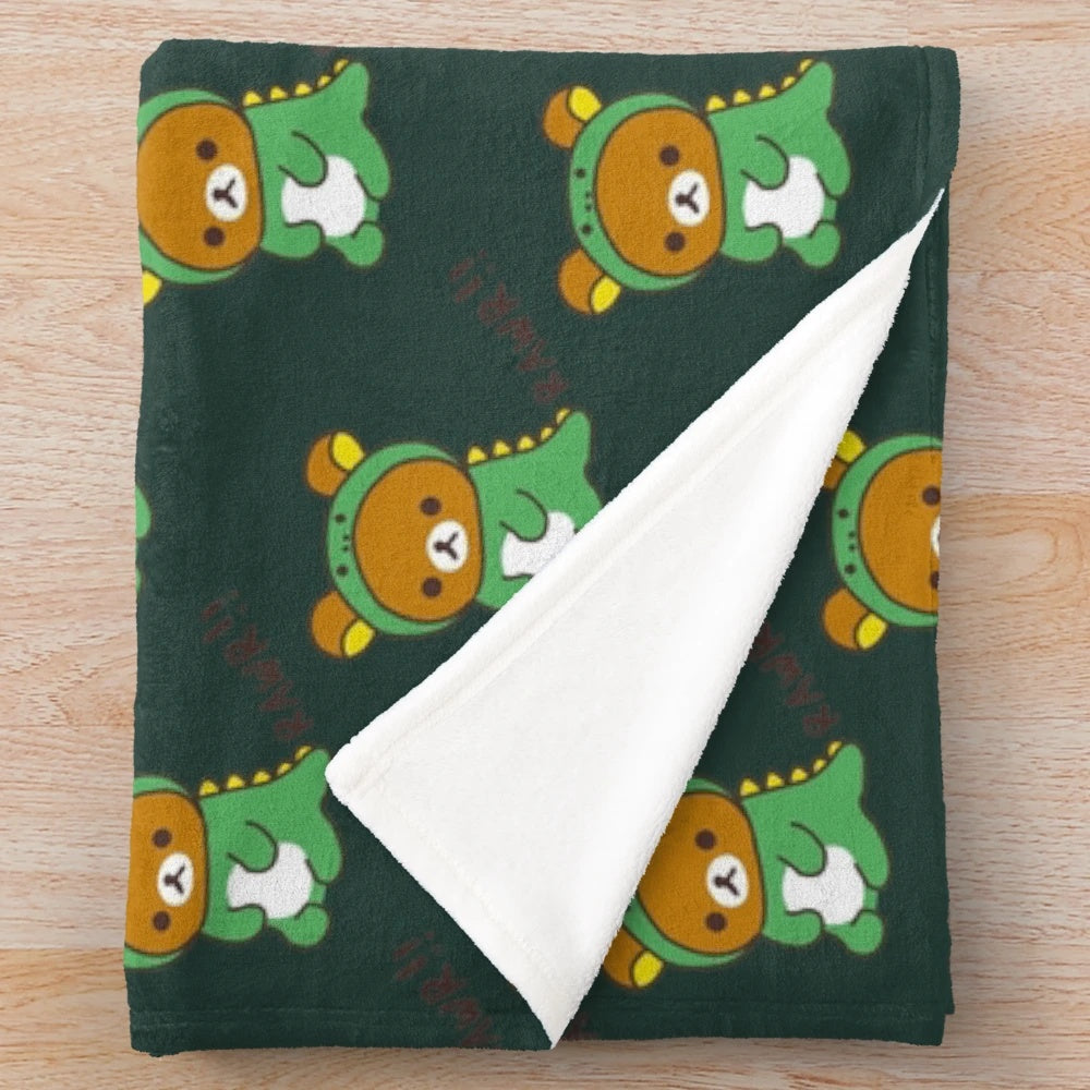 Rilakkuma-themed plush blanket with dino dragon costume design