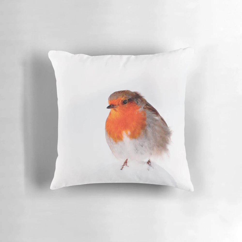 Soft, plush pillow featuring a robin redbreast bird in a snowy, frosty winter scene