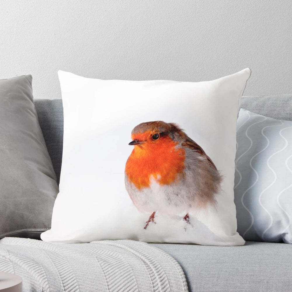 Soft, plush pillow featuring a robin redbreast bird in a snowy, frosty winter scene