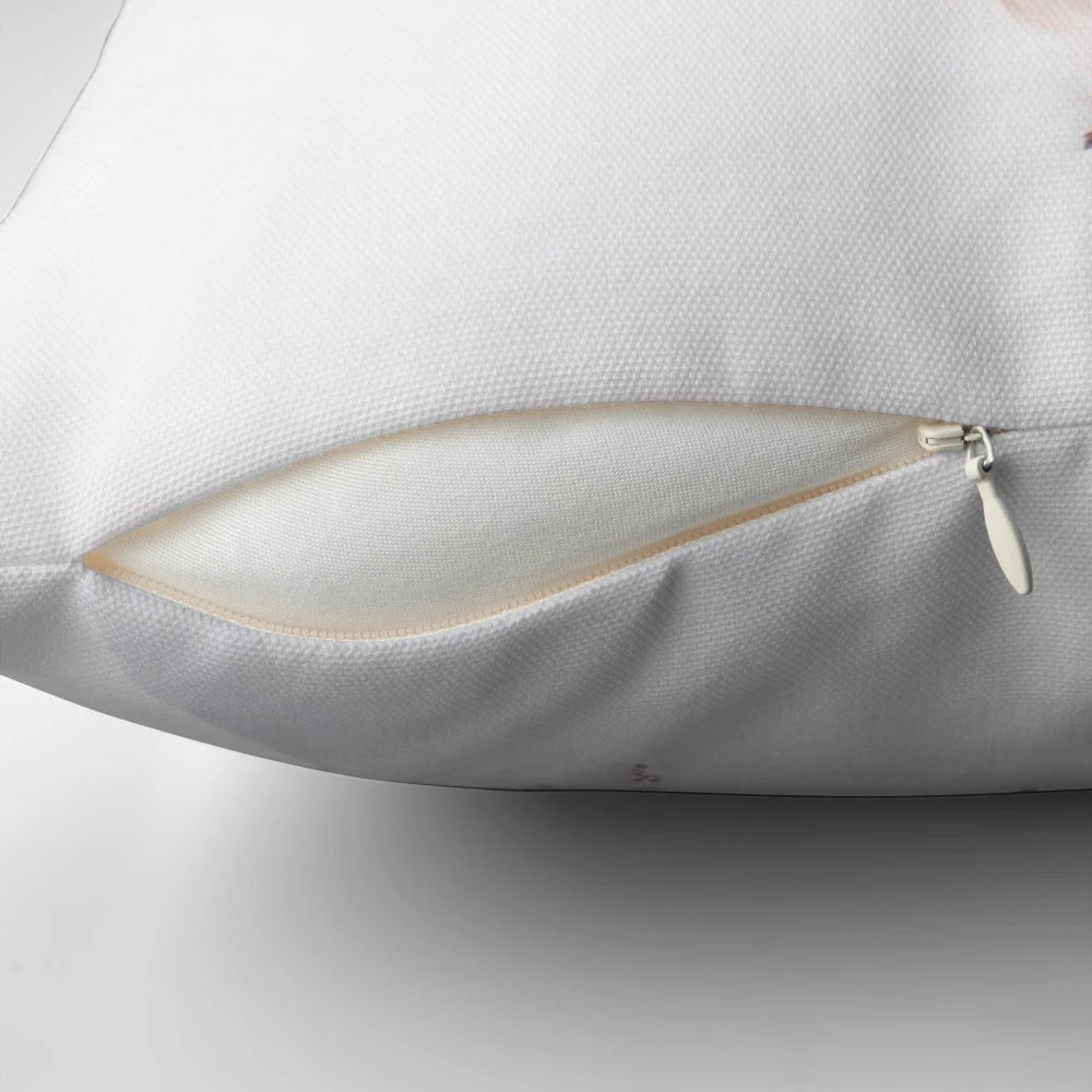 Soft, plush pillow featuring a robin redbreast bird in a snowy, frosty winter scene