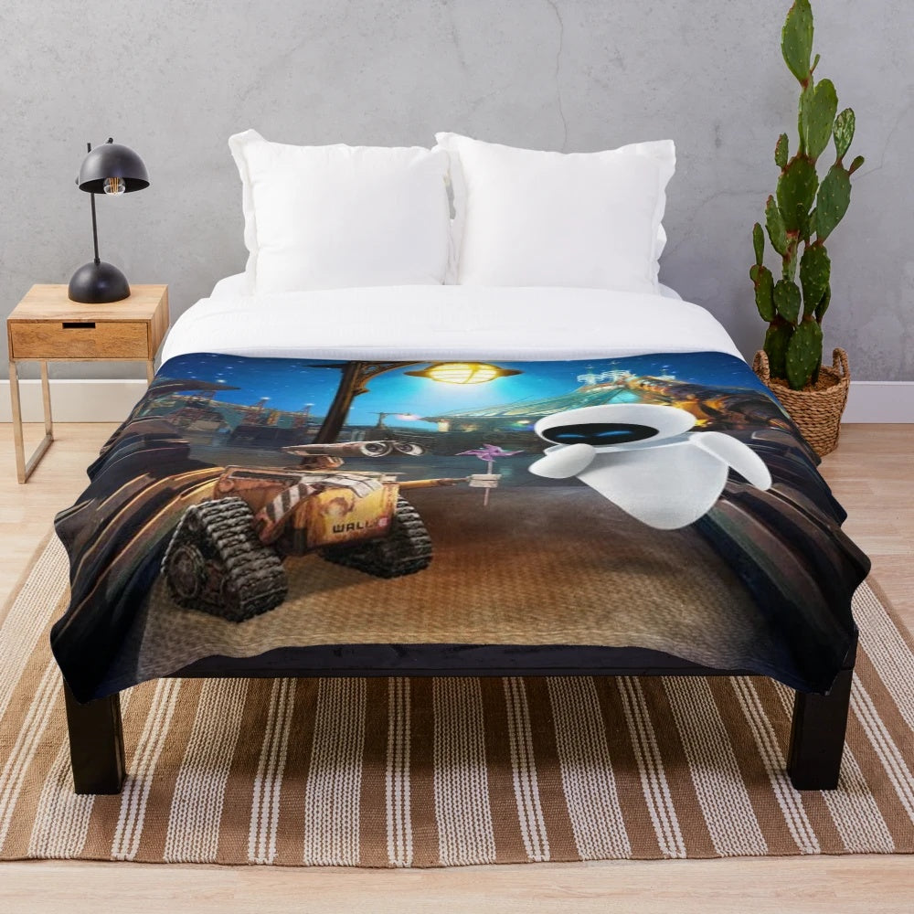 Wall-E and Eve robot characters printed on a soft, plush blanket