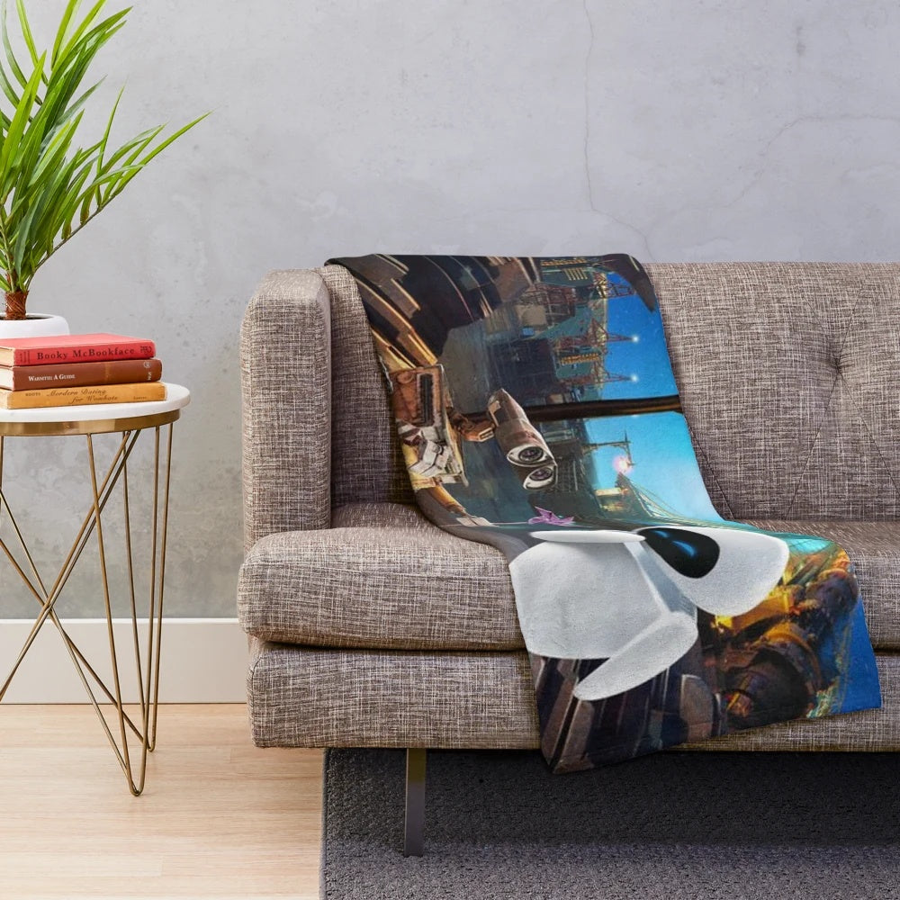 Wall-E and Eve robot characters printed on a soft, plush blanket