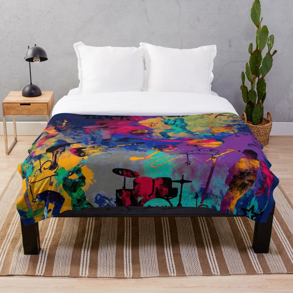 Soft and snuggly plush blanket featuring a rock band design for music lovers