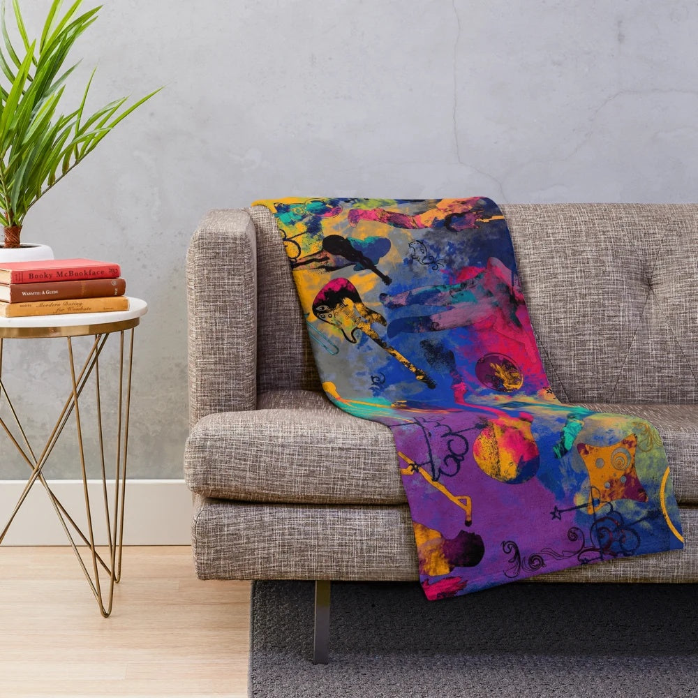 Soft and snuggly plush blanket featuring a rock band design for music lovers