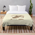 Rodeo-themed plush blanket with cowboy and cowgirl elements