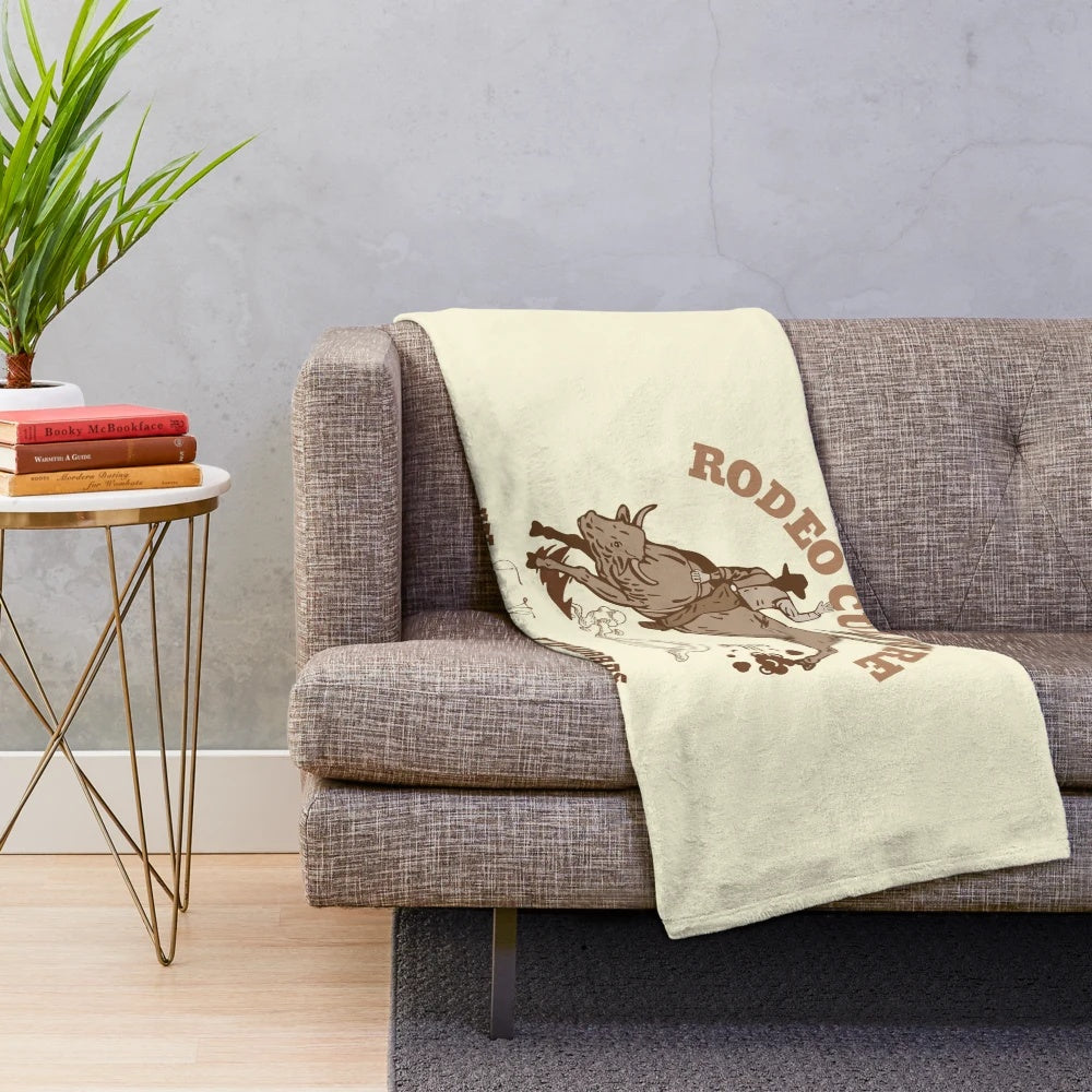 Rodeo-themed plush blanket with cowboy and cowgirl elements
