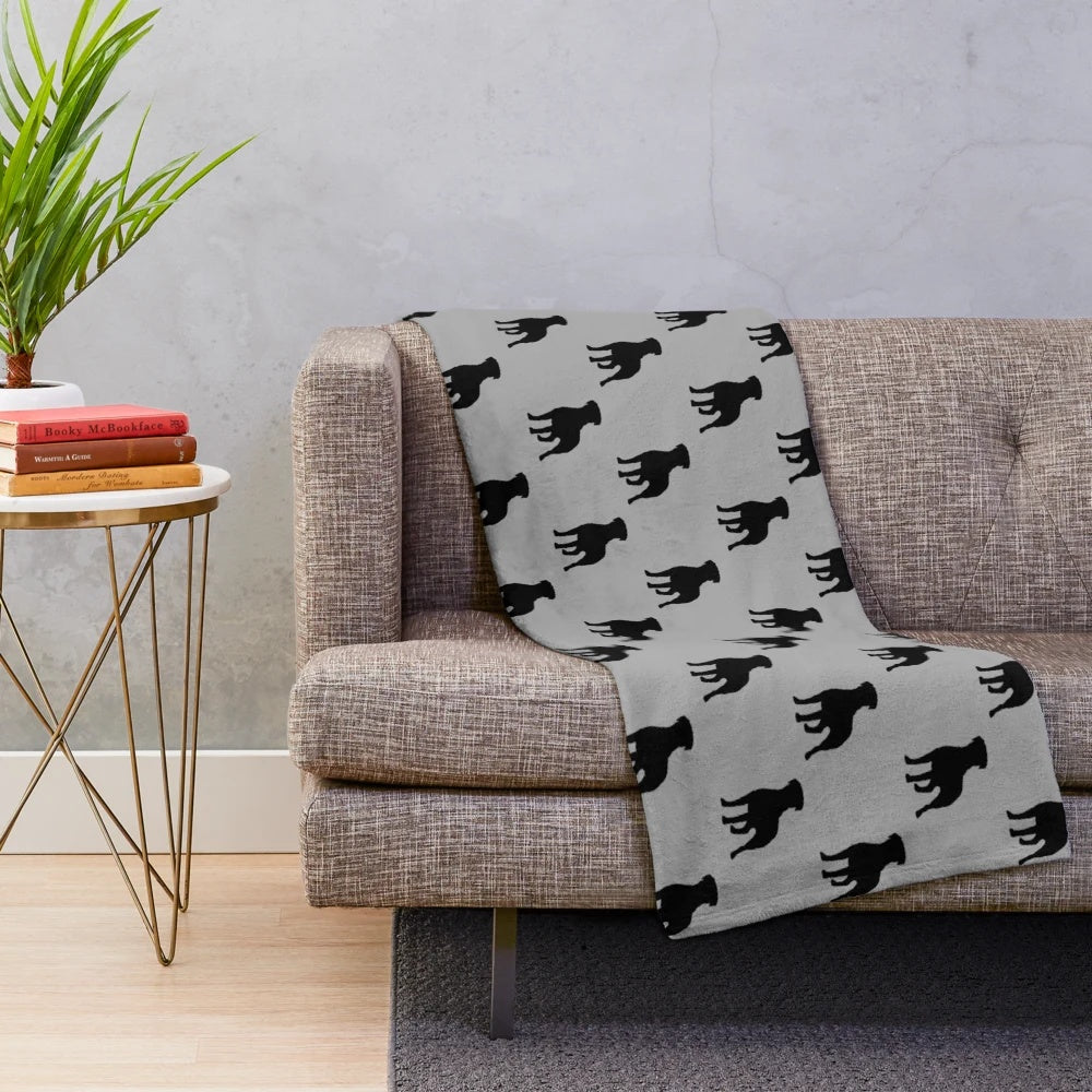 Rottweiler silhouette design on a plush, cozy blanket