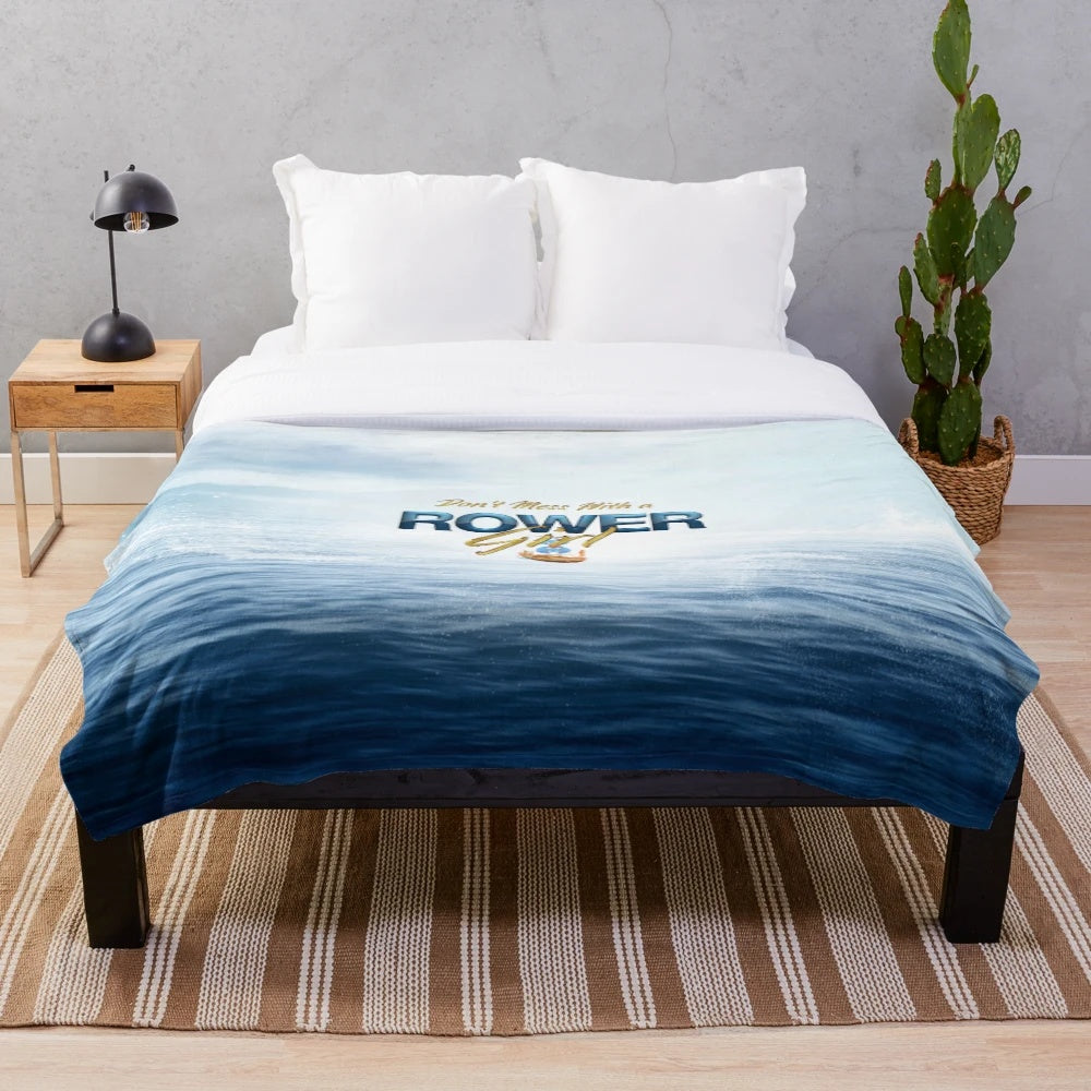 A plush blanket with a "Don't Mess with a Rower Girl" slogan, perfect for rowers and water sports enthusiasts.