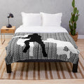 Rugby-themed plush blanket in black and white