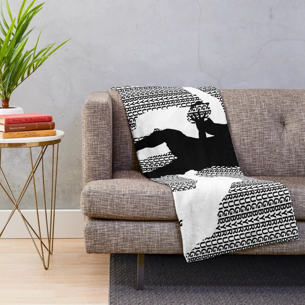 Rugby-themed plush blanket in black and white