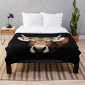 Plush blanket with beautiful cow designs in a rustic country style