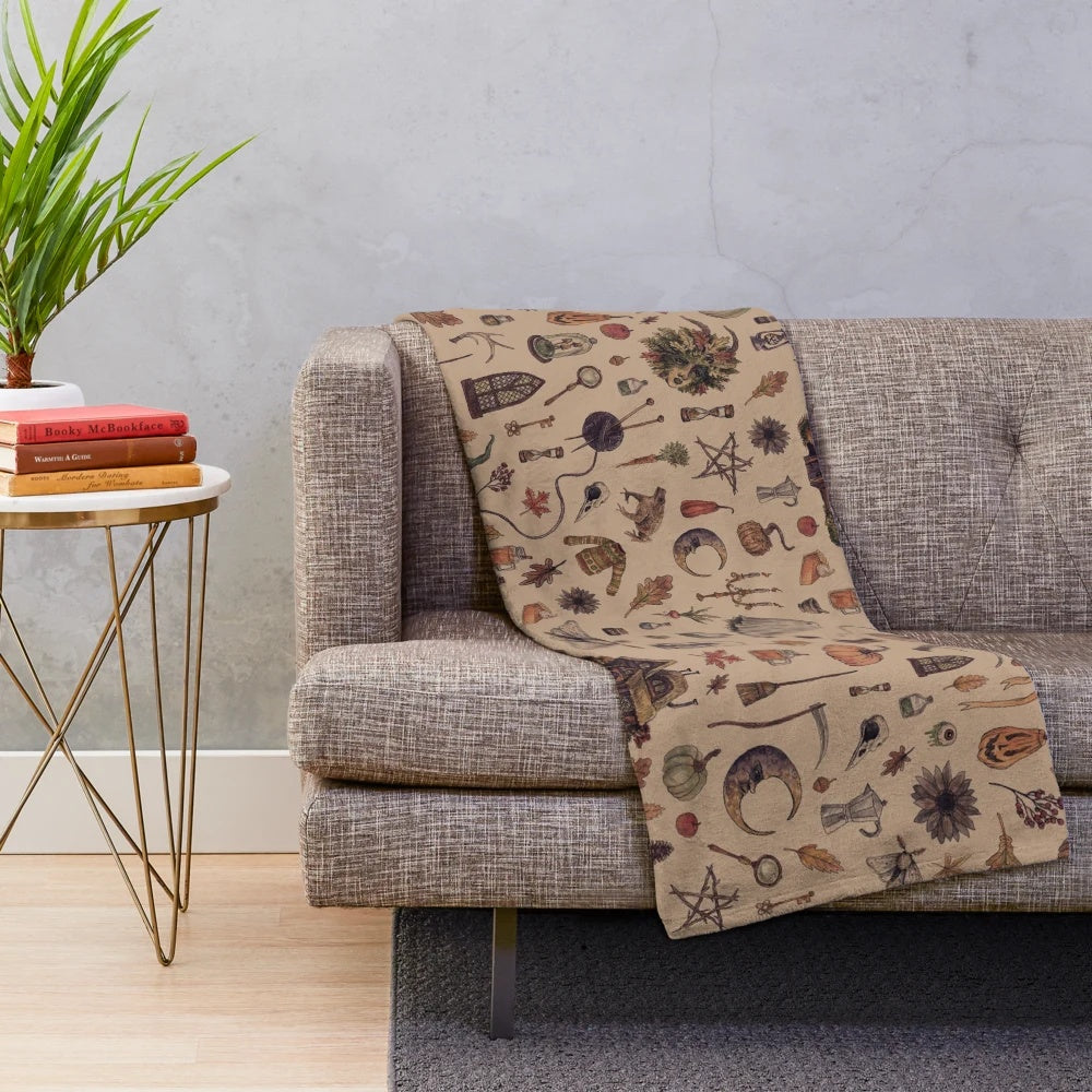 Rustic brown plush blanket with cottagecore and Halloween design elements