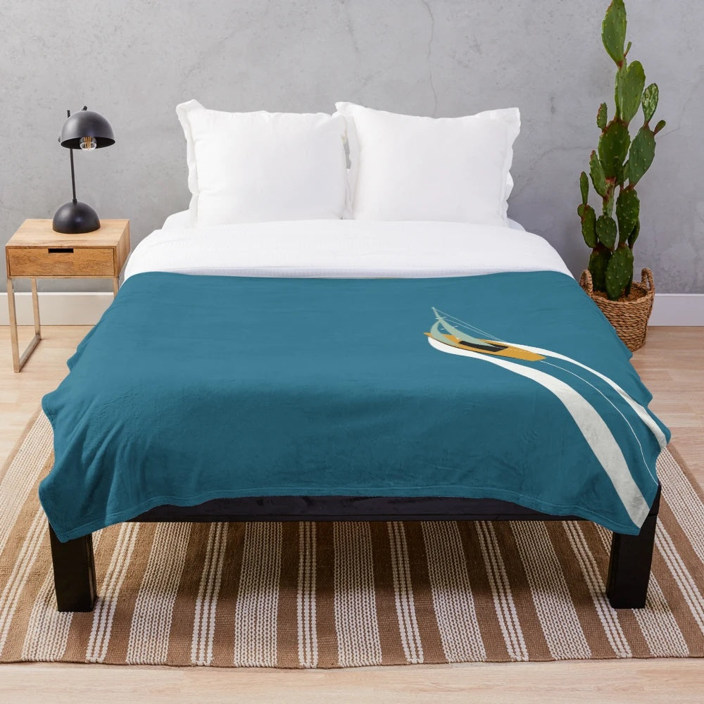 Plush blanket with a sailing-inspired design