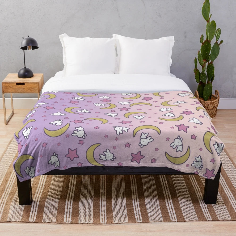 Soft and colorful plush blanket featuring a Sailor Moon-inspired Usagi moon bunny design